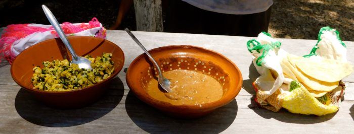 sampling tortillas, eggs and salsa at a traditional mayan village in the yucatan