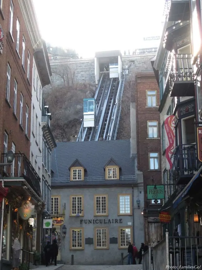 Quebec City: A TrÉS Bon Winter Weekend Destination With Kids Cars going up and down the funicular in old town quebec.
