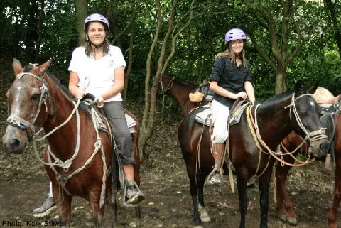 two girls horseback riding at buena vista adventures in costa rica.