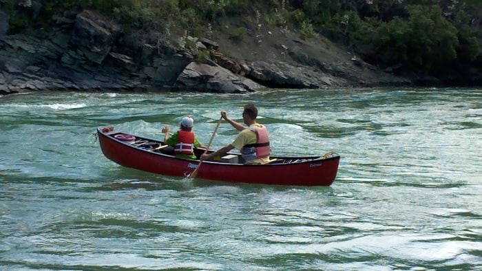 Learning to paddle a canoe can be fun for a kid if you have the right attitude