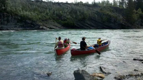 father-son canoeing on the bow river