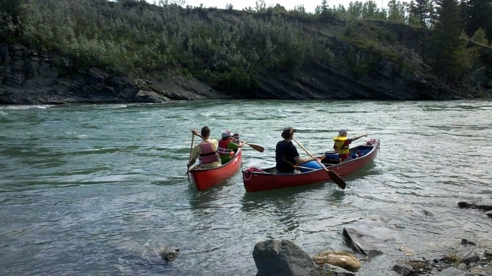 Father-son canoeing on the bow river