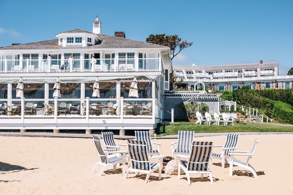 The chatham bars hotel has an old-money new england feel with its gray roof, whitewashed walls and blue-and-white striped furniture.