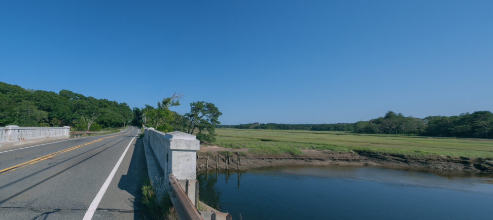 Route 6 offers cape cod's bucolic side with stretches of trees, lawns and inland ponds.