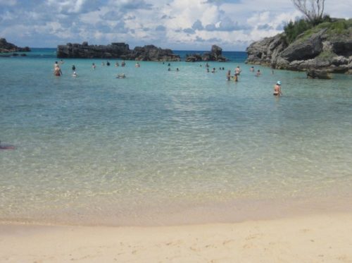 People swimming in well protected tobacco bay