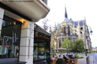 reims: plan a fun champagne day trip, even with kids along: a square with a view of notre dame in reims