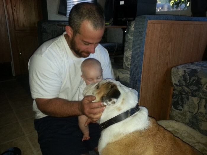 Mindi rosser's husband, baby and dog on their rv adventure