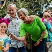 3 generations share a snack at disney World