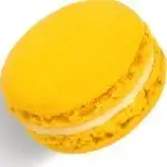 6 Unique Paris Activities Kids Will Love a lemon macaron from laduree in paris