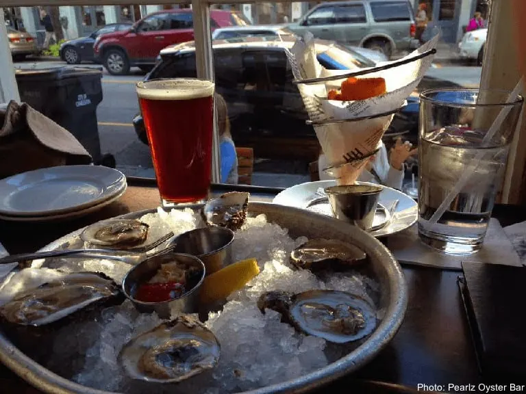 oysters, beer and corn fritters at pearlz