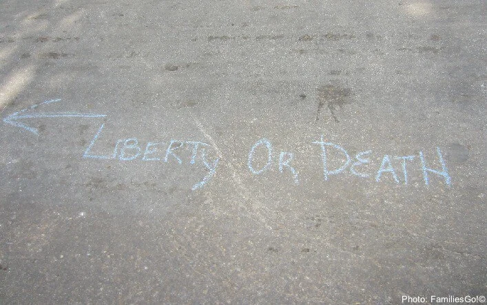 "give me liberty or give me death" graffiti in williamsburg takes oi a whole new way on a ghost tour.