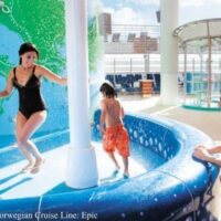 12 Vital Questions To Ask Before Booking A Cruise With Kids: Here is a toddler in a kids' pool, which is very important