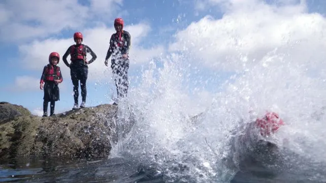 a family coasteering in wales