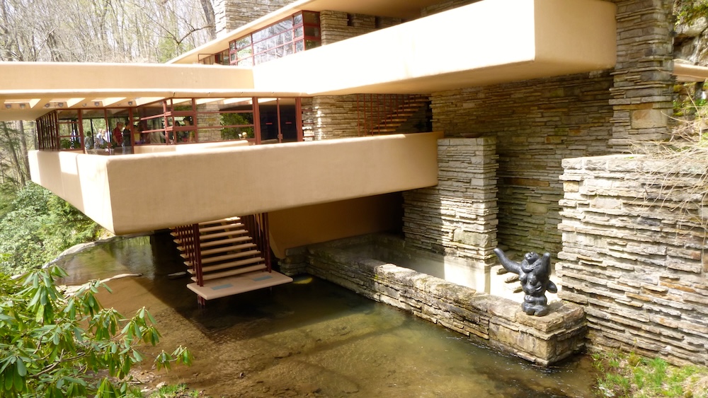 Fallingwater's namesake feature is the stream running under the house, with stair leading down to it from the living room.