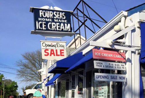 the four seas has a vintage sign and modern ice cream flavors