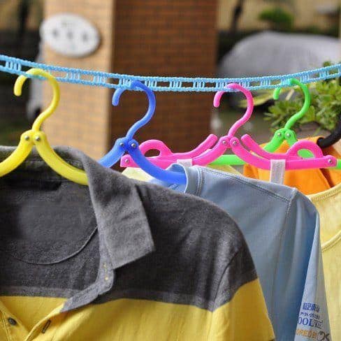 Pack clothes that dry quickly on clothesline for easy laundry on vacation