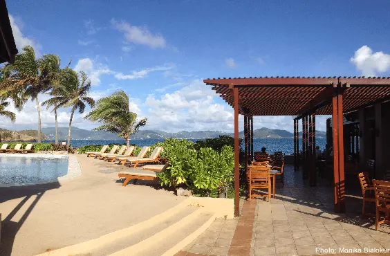 the pool and pool-side restaurant at st. peter island resort