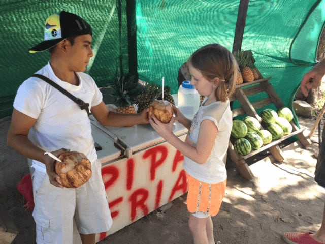 Fresh coconut is a great kids treat in costa rica