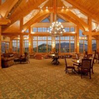 2 Lake Placid Hotels That Can't Be Beat For Location & Value: The Great Room at the Crowne Plaza Hotel is the ideal place for families and small groups staying there to gather for snacks, coffee, drinks, games or just the fireplace and view.