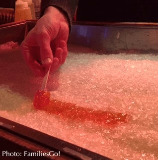 Frozen maple syrup is eaten like a lollypop for an inexpensive street treat in montreal