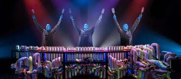 blue man group is musical. here they are banging on pipes.blue man group is musical