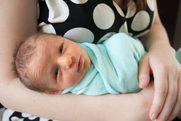 Flying with a baby won't be as bad as you think; it will probably snuggle up and sleep for part of the flight