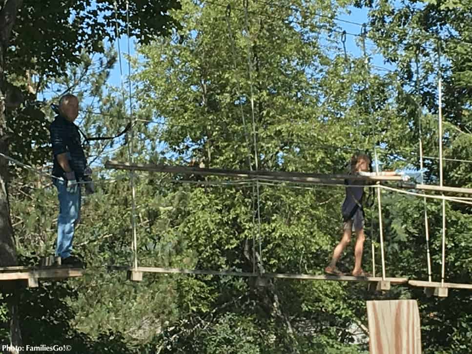 aerial park at jiminy peak resort offers summer fun for kids and parents. 