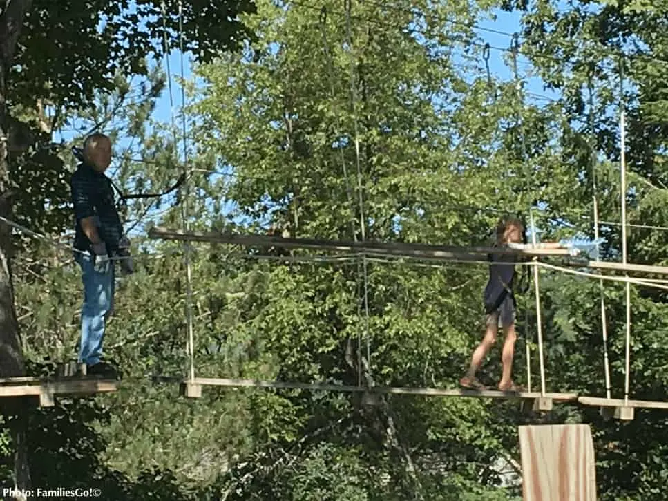 aerial park at jiminy peak resort offers summer fun for kids and parents. 