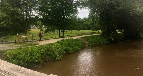 a wide tow path follows the delaware river near lambertville, nj. it's popular with families looking for a flat, scenic bike ride. 