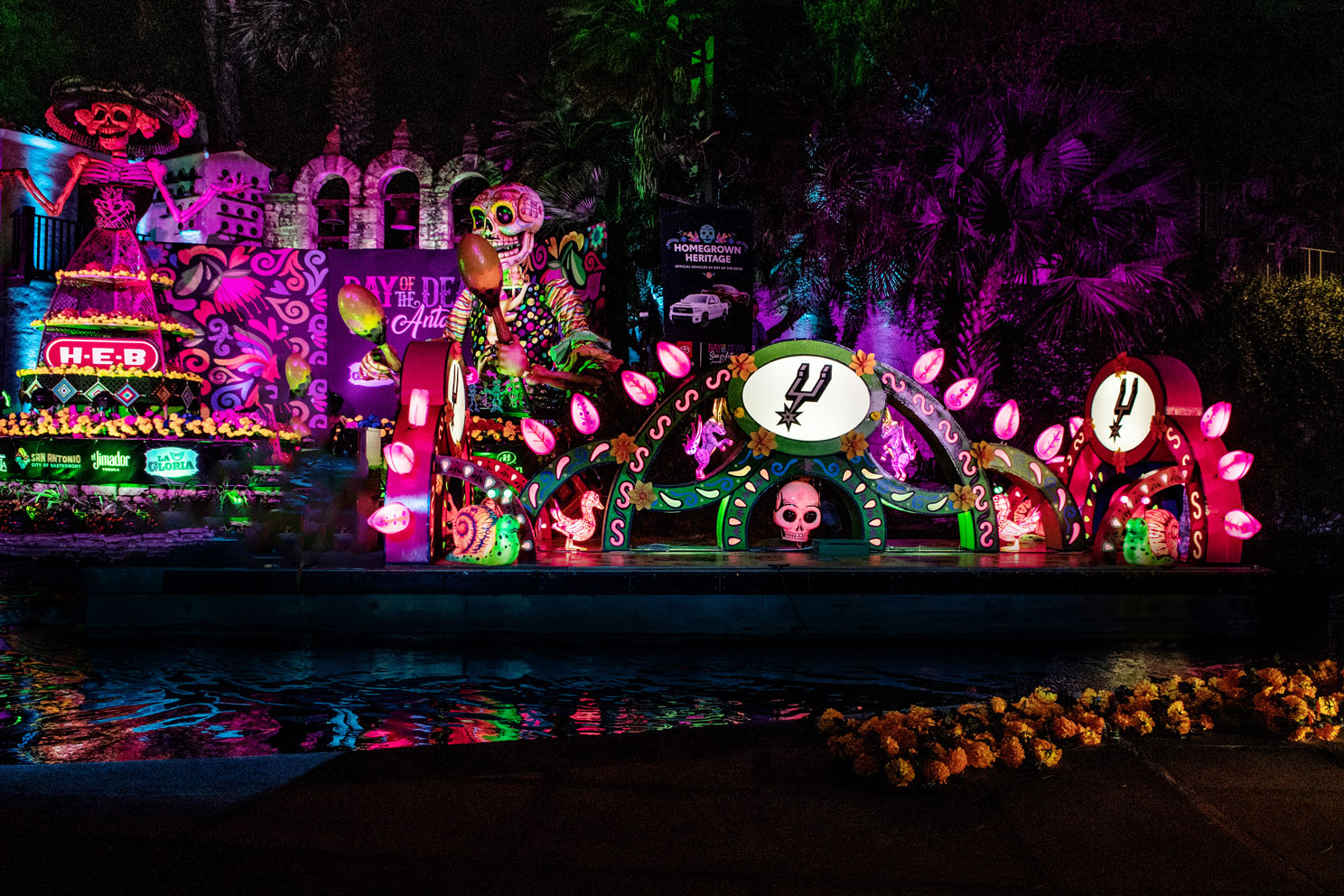The riverwalk in san antonio hosts a floating dia del lost muertos parade before halloween