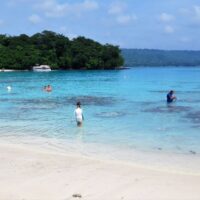 Champagne Bay's clear blue waters are a big attraction to visitors