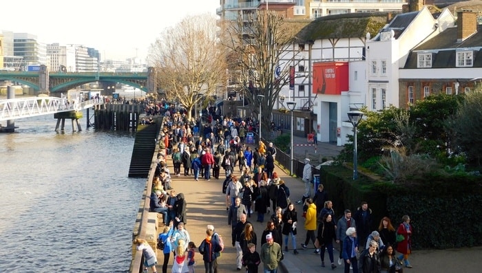 london's busy south bank on a sunny day