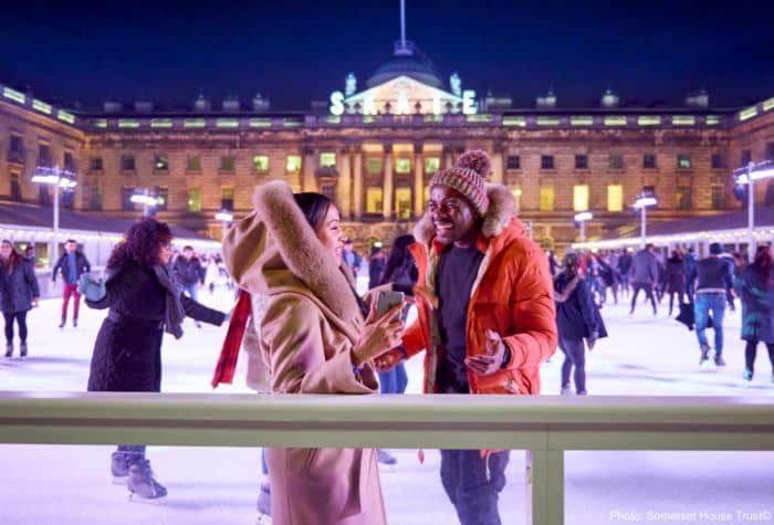 Ice skating in front of stately somerset house