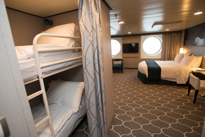 Rroyal caribbean has larger family cabins for those who need more room. This one has bunk beds with privacy curtains.