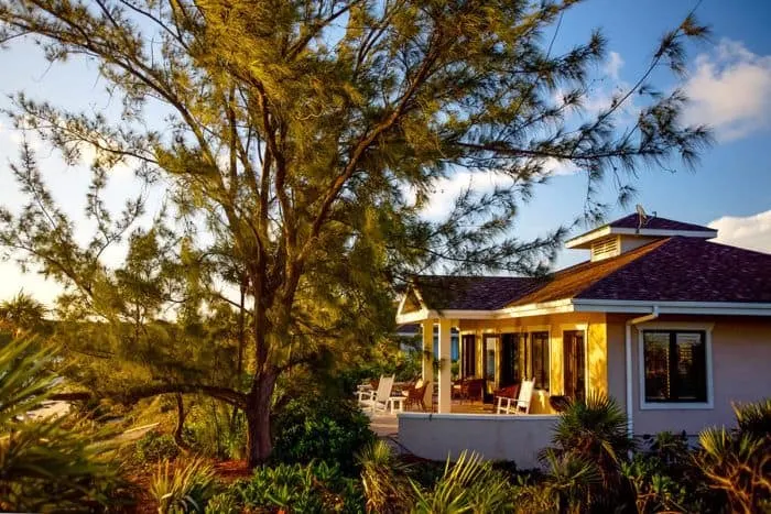 Packing List: Caribbean Vacation With Kids yellow vacation home in the bahammas