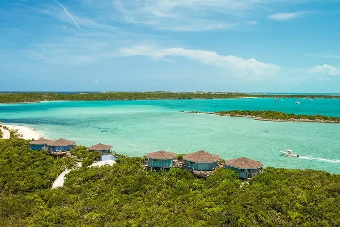 the bahamas is a great place to rent a house because of its clear turquoise waters and calm surf