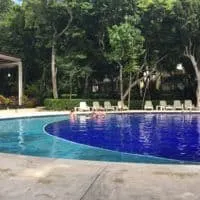 the lush secluded pool at adults only Bahia Principe Sian Ka'an