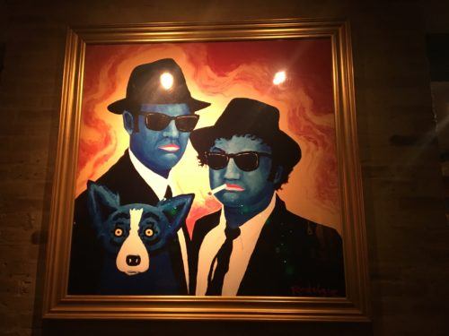 the blue dog with the blues brothers at the dog's eponymous lafayette café