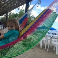 having fun in the hammocks at Playa Uvas