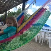 having fun in the hammocks at Playa Uvas