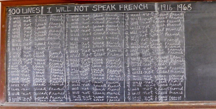 chalk board representing louisiana's anti-french campaign