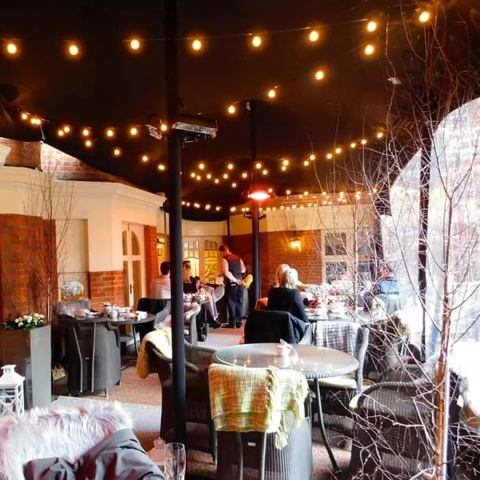 Our Teen's Top 11 Things To Do In London The outdoor patio for tea at st. Ermine's hotel