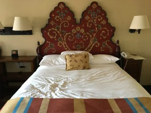 handpainted headboards are one of la fonda's signature details.