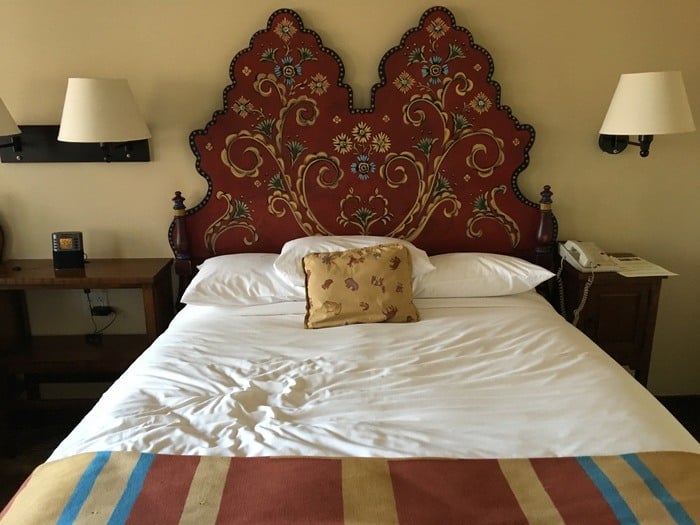 Handpainted headboard are one of la fonda's signature details.