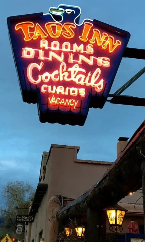 The neon sign at the historic taos inn