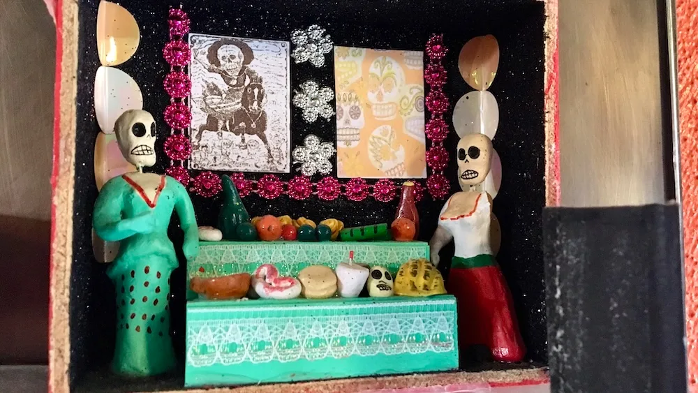 Day of the dead decorations are some of the many knickknacks at orlando's, a family-friendly southwester restaurant in taos.