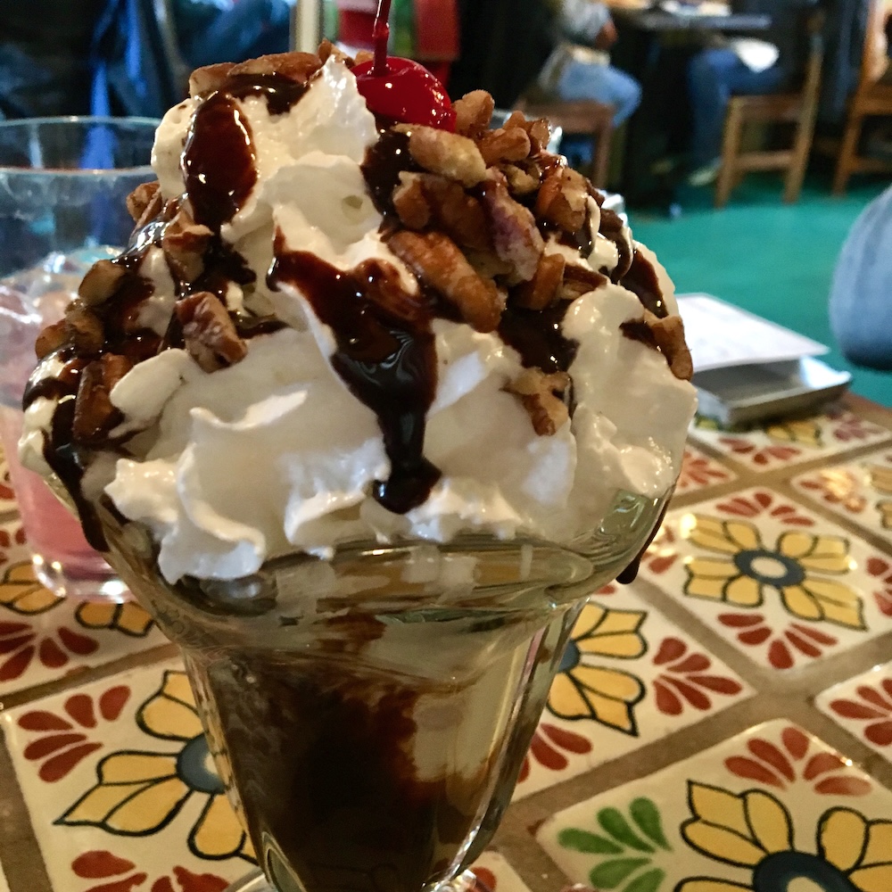 The hot fudge sundae is one of the reasons kids like eating at orlando's new mexican café in taos.