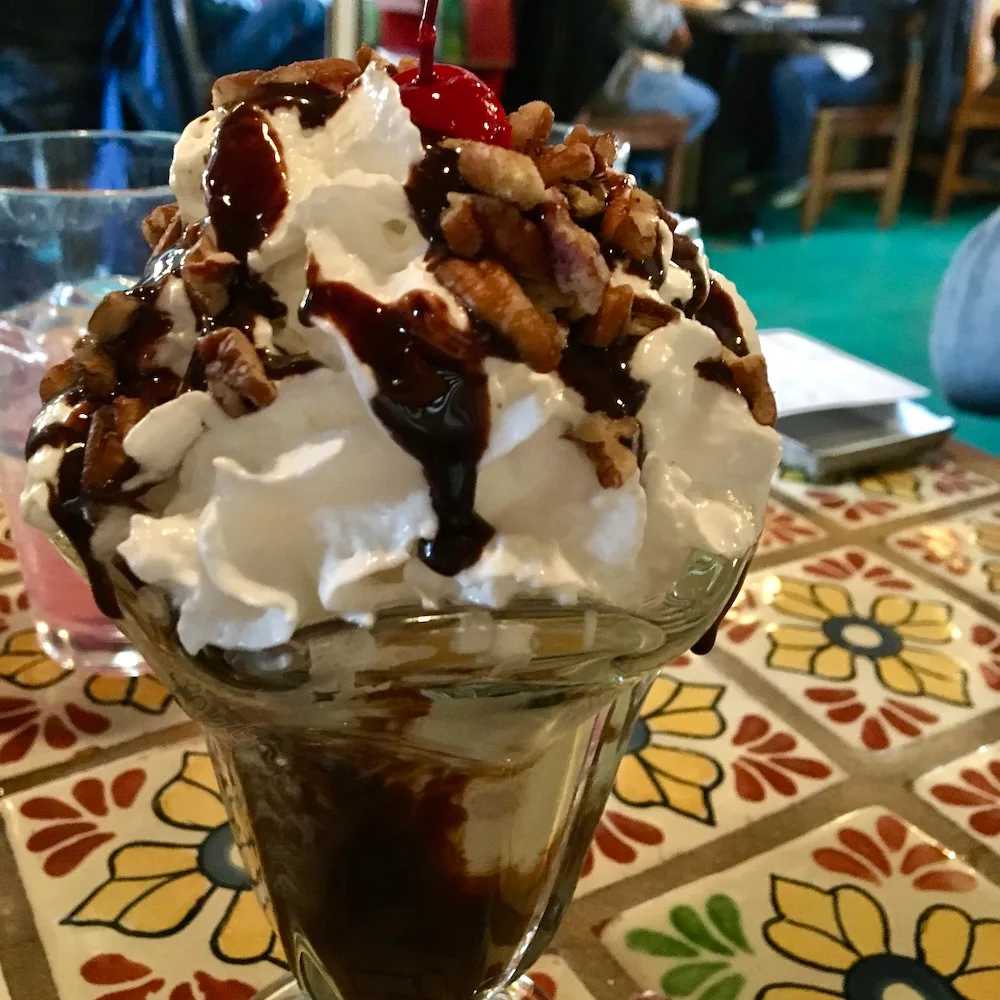 The hot fudge sundae is one of the reasons kids like eating at orlando's new mexican café in taos.