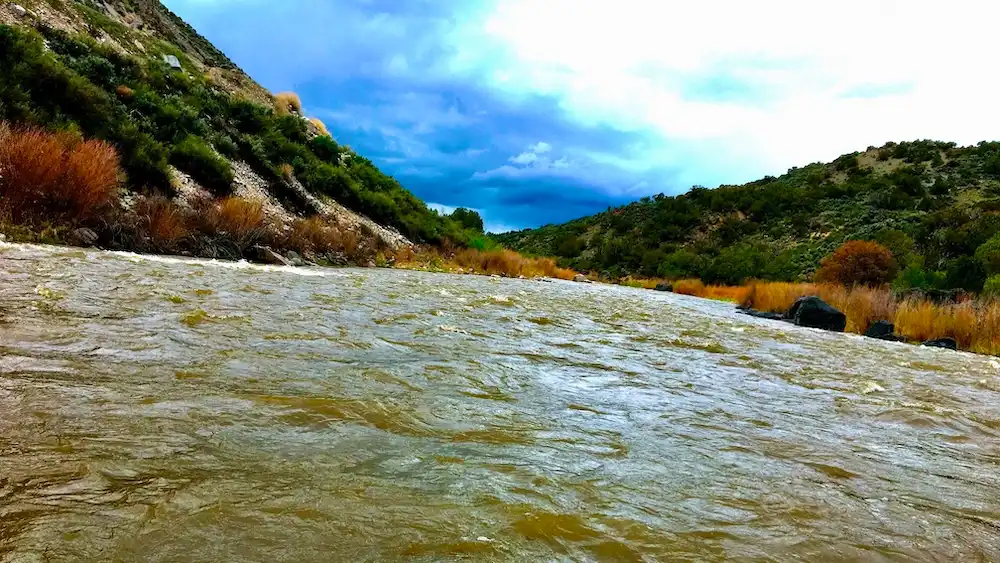 Small rapids on the portion of the rio grande outside of taos are ideal for rafting trips with kids.
