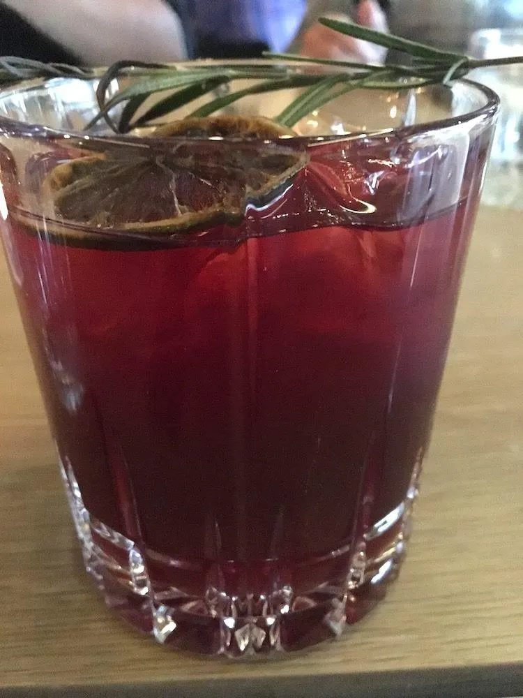 a blueberry cocktail at a lapland restaurant
